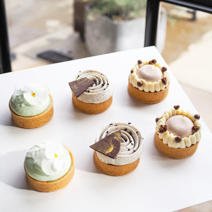 mini tartlets: coconut pandan, black sesame, and chocolate sobacha