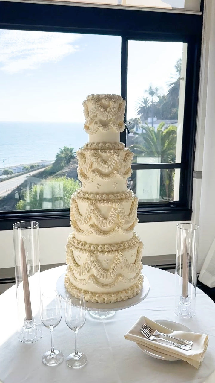 four tiered vintage cake for a wedding / bel-air bay club
